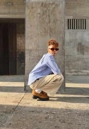 Timberland DENIM WIDE LEG PANTS. - Wide leg -  light beige