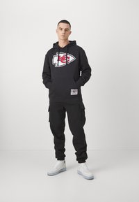 Mitchell & Ness Men's NFL Training Room S/S Hoody Atlanta Falcons Hoodies