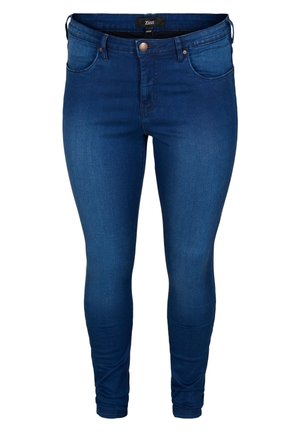 Tmavomodré džínsy skinny s klasickým päť-pocket dizajnom a gombíkovým zapínaním. Hladká textúra a zúžený strih nohavíc.