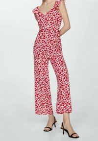 Rood en wit bloemen jumpsuit met een getailleerde bovenkant, gerimpelde schouderbanden en wijde broekspijpen. Lichtgewicht stof met een gladde textuur.