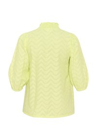 Blusa verde lima con textura en zigzag, mangas abullonadas y un cuello alto fruncido. Corte recto con un dobladillo redondeado.
