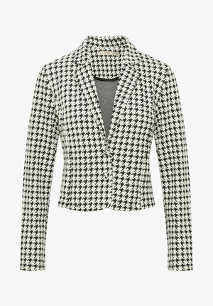 Čierno-biely sako s houndstooth vzorom, dlhými rukávmi, zúženými klopami a predným zapínaním na gombíky. Štruktúrovaná tkanina s pevným dizajnom.