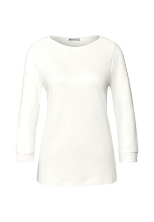 Weißes Damenoberteil mit langen Ärmeln, rundem Halsausschnitt, geradem Schnitt und minimalen Nahtdetails an Ärmeln und Körper.