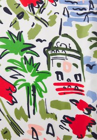 Colorful fabric design featuring palm trees, a building with details in red and green, set against a white background with blue accents.