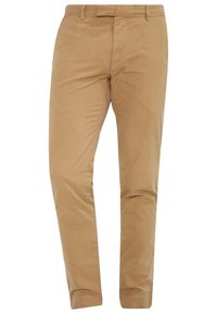 Beiga bomullschinos med en slät textur, slim fit och klassisk femfickdesign. Har en midja med bälteshällor och subtil sömnad.