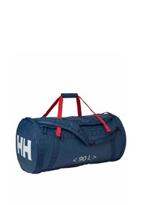 Navy duffel bag met rode banden, gemaakt van duurzaam materiaal. Heeft een groot wit logo en een ritsluiting; capaciteit van minder dan 90 liter.