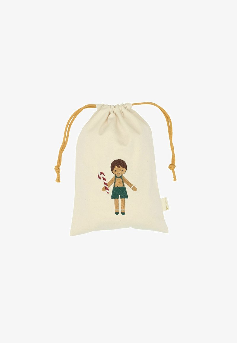 Bolsa de algodón con cierre de cordón, de color crema, que presenta una ilustración de un niño sosteniendo un caramelo en forma de bastón, con acentos en verde y marrón.