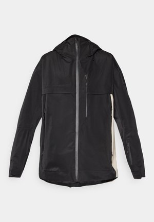 Svart jacka med huva, utrustad med dragkedja fram, två sidfickor med dragkedja och texturerad tyg. Slimmad, modern design med rena linjer.