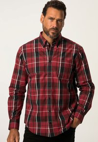 Rot-schwarz karierte Button-Up-Hemd mit langen Ärmeln, ausgestattet mit einer kleinen Tasche und einem abgerundeten Saum, aus gewobener Baumwolle gefertigt.