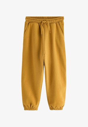 Sennepsgule joggingbukser med elastisk linning og manchetter, forlommer og snører i taljen.