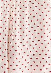 Lindex WITH LONGER LEG - Pantaloni del pigiama - red