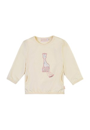 Maglietta a maniche lunghe di un delicato giallo chiaro, realizzata in un tessuto morbido, con un design di giraffa ricamato in rosa e verde e aperture laterali.