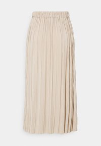 Jupe midi plissée en beige clair. Taille élastique, tissu doux et texture détaillée créent une silhouette fluide.