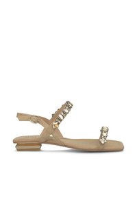 Sandal con flat beige, tacco basso, cinghie incrociate e borchie decorative in metallo. Presenta una cinghia alla caviglia regolabile e una texture liscia.