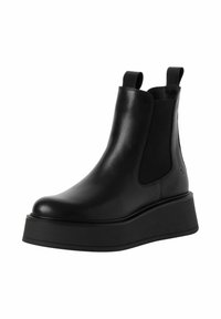 Bocanci negri din piele, cu panouri elastice pe laterale, vârful rotunjit și un talpă groasă. Dispune de bucle pentru a facilita îmbrăcarea.