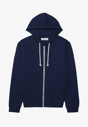 Navy blue zip-up hoodie with a front pocket, white zipper, and drawstrings. Made from soft material with a hood for added coverage.