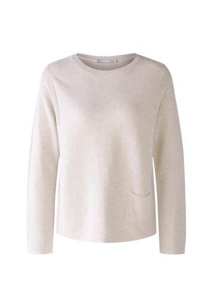 Helles beige Langarm-Sweatshirt aus weichem Stoff, mit Rundhalsausschnitt und einer kleinen Tasche auf der linken Seite.