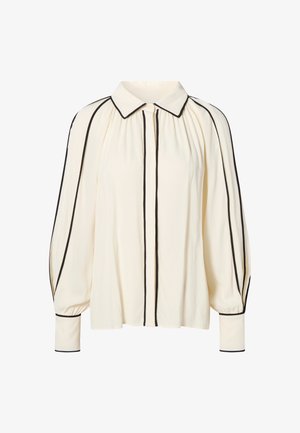 Krémová blúzka s čiernymi vertikálnymi pruhmi, klasickým golierom a nadýchanými rukávmi. Má zapínanie na gombíky vpredu a kontrastné manžety. Hladká textúra.