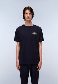 Navy blue cotton t-shirt with a round neckline and short sleeves, featuring a small beige Napapijri logo on the left chest.
