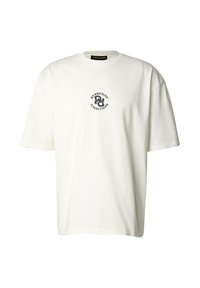 Vit bomullst-shirt med rund halsringning och korta ärmar. Har en svart cirkulär "Everyday Ambition"-logotyp på bröstet.