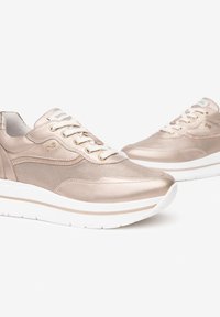 Metallic gold sneakers with mesh detailing, round toe, lace-up front, and white cushioned sole. Features gold hardware accents.