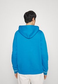 Tommy Hilfiger MONOTYPE COLLEGIATE HOODIE - Felpa - cerulean aqua
