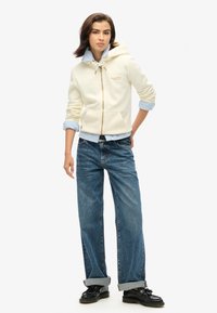 Superdry & Co ESSENTIAL mleczny