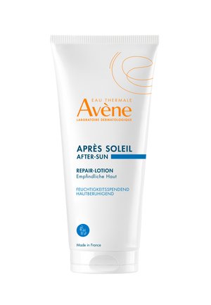 White squeeze tube containing Avène After-Sun Repair Lotion. Features orange and blue text, and claims to hydrate and soothe sensitive skin.