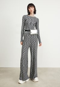Mads Nørgaard SPACE VERAN PANTS - Leggings - multi black