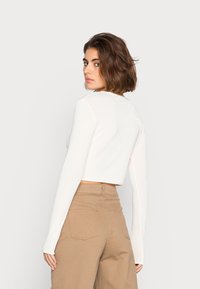 NA-KD Casaco de malha - offwhite