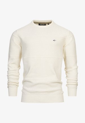Cream-colored knitted sweater with a textured pattern, crew neck, and ribbed cuffs and hem. Features a small blue logo on the chest.