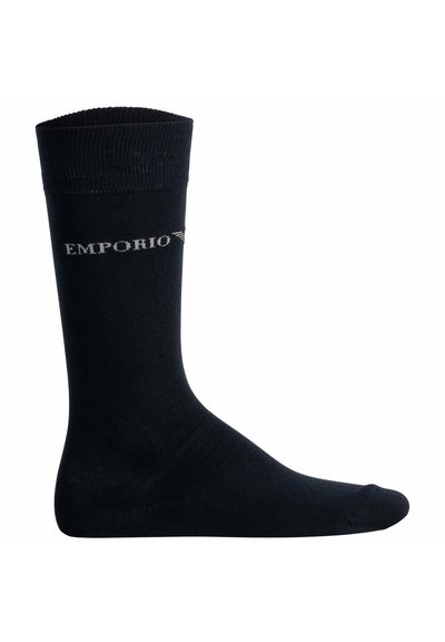 Svart bomullssocka med ribbad mudd och broderad texten "EMPORIO" i grått. Slät textur med standardlängd upp till vaden.