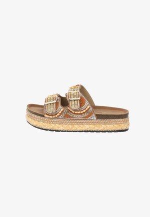 Brown beaded sandals with two adjustable buckles, a thick woven espadrille platform, and a textured outsole. Rich orange and gold accents.