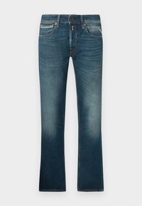Jeans de mezclilla azul con un lavado desvanecido, que cuentan con cinco bolsillos, cierre de cremallera y un diseño de pierna recta. Costuras bordadas en hilo de contraste.