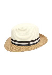 Sombrero de paja con una corona blanca, ala marrón y una banda a rayas en blanco y negro. La textura es tejida con un acabado suave.