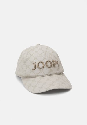 Beige cap with a textured pattern, featuring an embroidered "JOOP!" logo on the front and a curved brim. Crafted from fabric material.