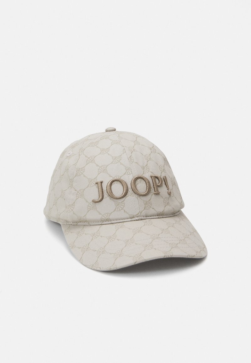 Beige sapka textúrált mintával, elöl hímzett "JOOP!" logóval és ívelt peremmel. Szövetből készült.