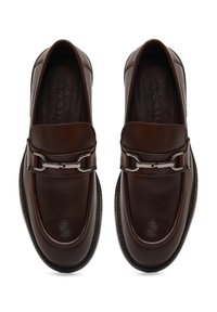 Brown leather loafers with a smooth texture and rounded toe. Silver hardware accents and stitching detail along the sides.