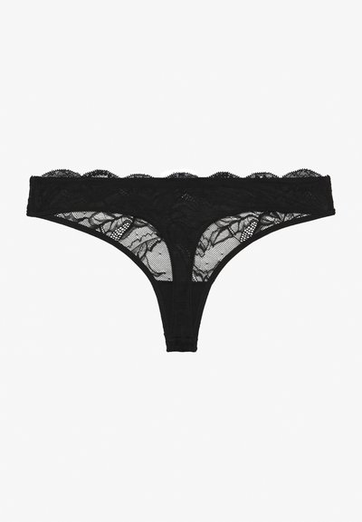 Zwarte kanten string met geschulpte randen, voorzien van bloemenpatronen en gaasdetails. Vloeiend stof met een delicate textuur.