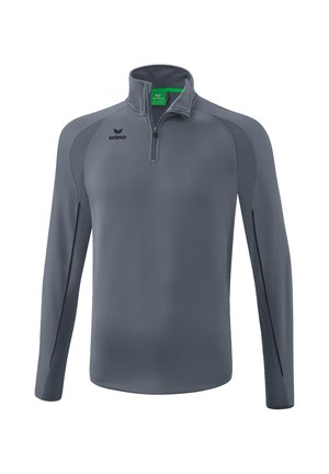 Pullover sportivo grigio a maniche lunghe con zip da un quarto e colletto alto, logo Erima sul petto sinistro, mostrato su sfondo bianco.