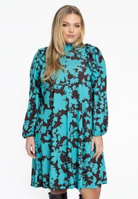 Türkis und schwarze Blumenmusterkleid mit langen Puffärmeln, hohem Kragen und ausgestelltem Saum. Hergestellt aus leichtem, glattem Stoff.