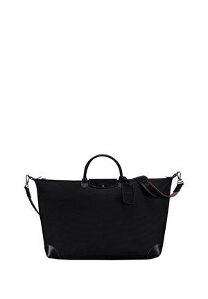Black nylon tote bag with leather accents. Features two top handles, a detachable shoulder strap, and a luggage tag. Rectangular shape.