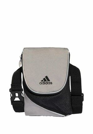 Grijze en zwarte Adidas schoudertas met een ritssluiting, mesh accenten en verstelbare riem met een plastic gesp.
