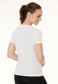 Endurance KEILY - Sports T-shirts - white