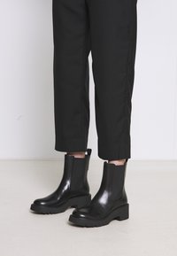 Camper Botines con plataforma - black