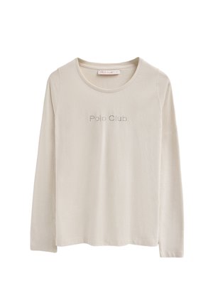 Camiseta de manga larga, color beige claro, hecha de tela suave. Presenta el texto "Polo Club" en strass en el centro. Cuello redondo.