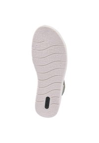 Schuhsohle aus weißem strukturiertem Gummi mit wellenförmigen Mustern und eingelegtem schwarzen Logo, entworfen für Grip und Stabilität.