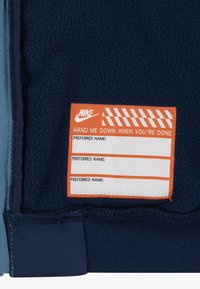 Nike Sportswear FUTURA UNISEX - Soft shell striukė - aegean storm