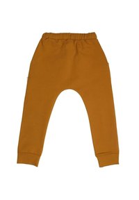 Senfgelbe Jogginghosen mit einem elastischen Bund, Seitentaschen und gerippten Abschlüssen. Glatte Textur, lässiges Design mit lockerer Passform.