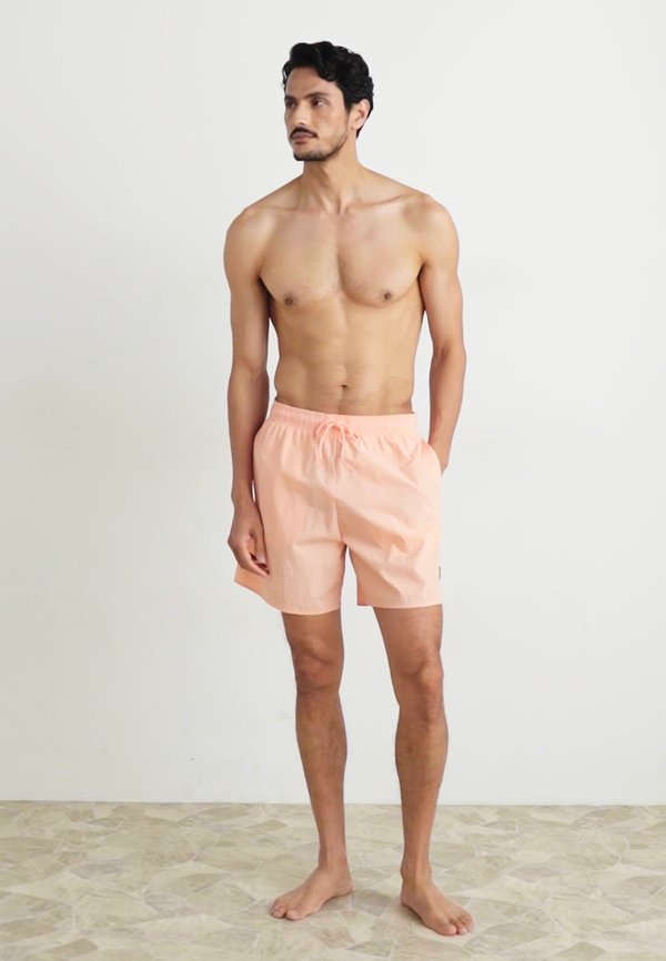 SWIM  - Swimming shorts - coral stand3